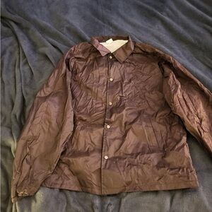 Brown Augusta Coaches windbreaker with buttons 
Xxl

Needs a good ironing